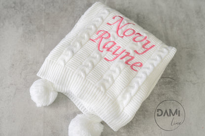 Personalised knitted baby blanket with 2 Pom-poms. Multiple colours available