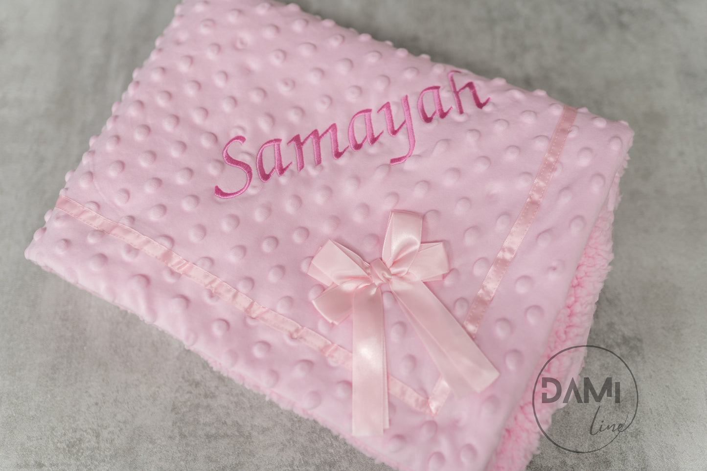 Personalised bubble blanket with satin bow and sherpa back. Multiple colours available.