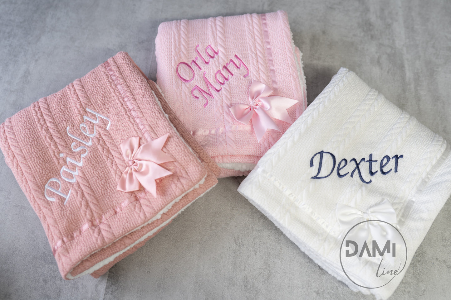 Personalised baby knitted blanket with satin bow and white sherpa back