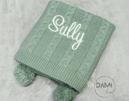 Personalised knitted baby blanket with 2 Pom-poms. Multiple colours available