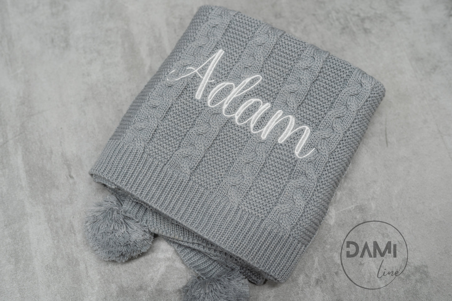 Personalised knitted baby blanket with 2 Pom-poms