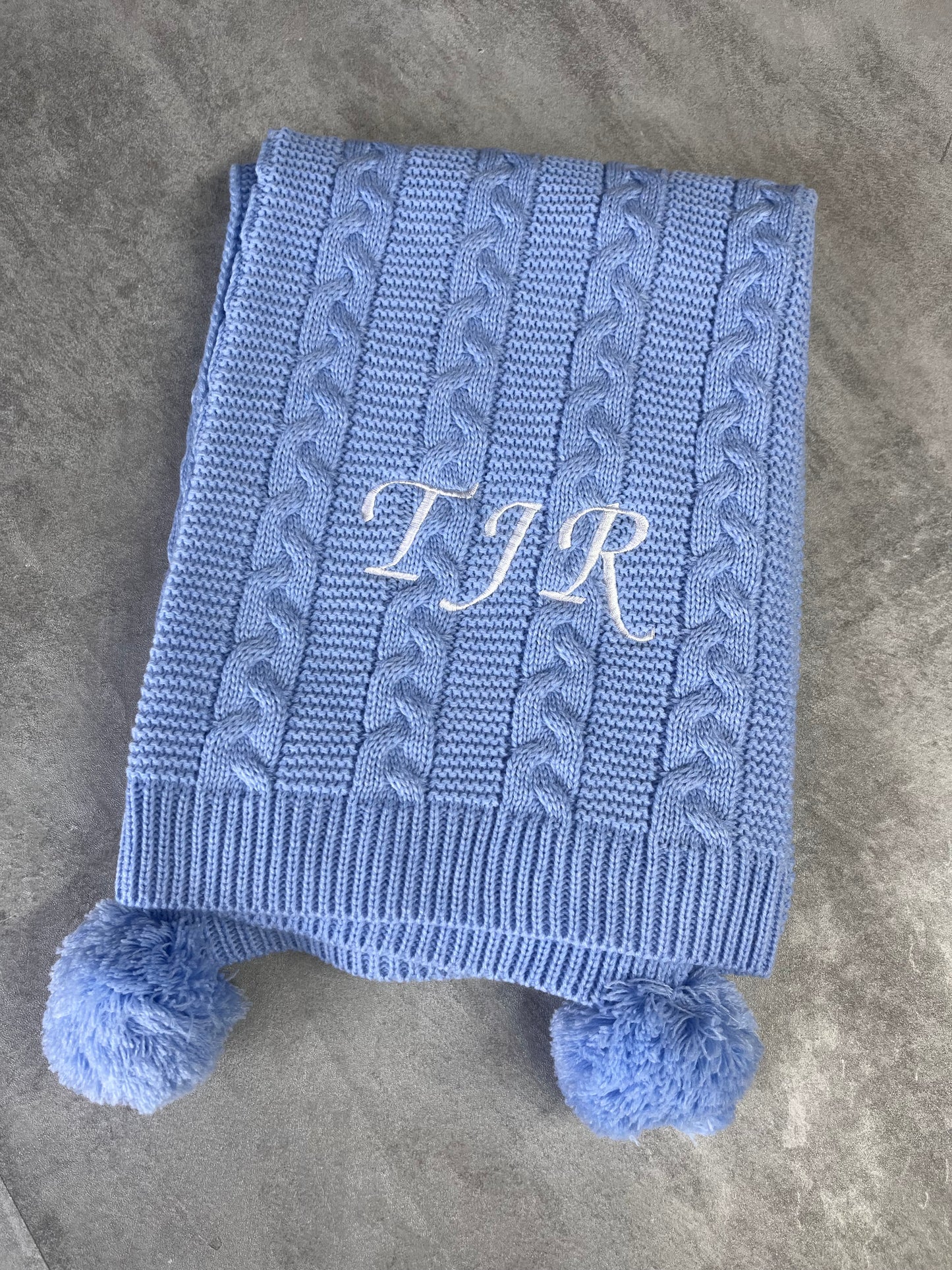 Personalised knitted baby blanket with 2 Pom-poms