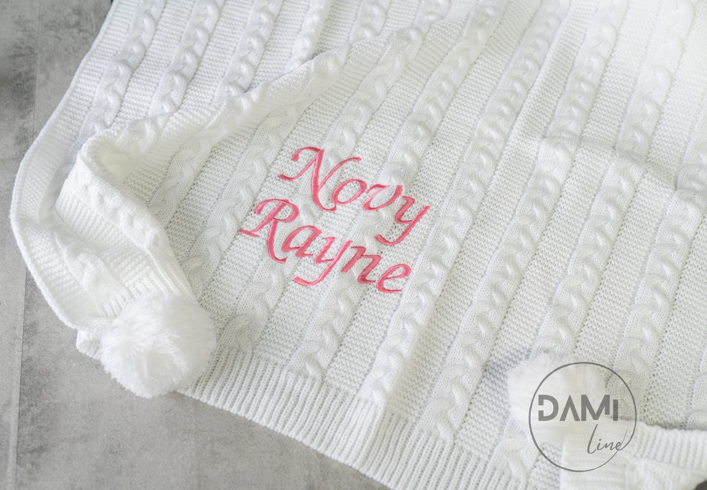 Personalised knitted baby blanket with 2 Pom-poms