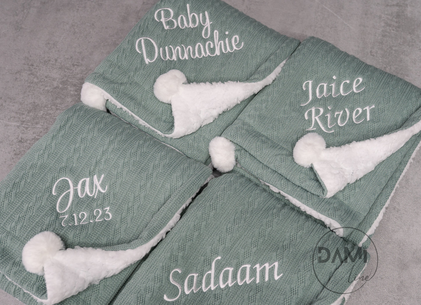 Personalised knitted SAGE baby blanket with sherpa lining and 2 pom-poms.