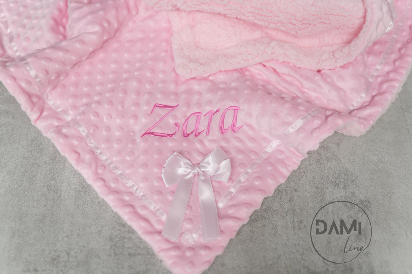 Personalised bubble blanket with satin bow and sherpa back. Multiple colours available.