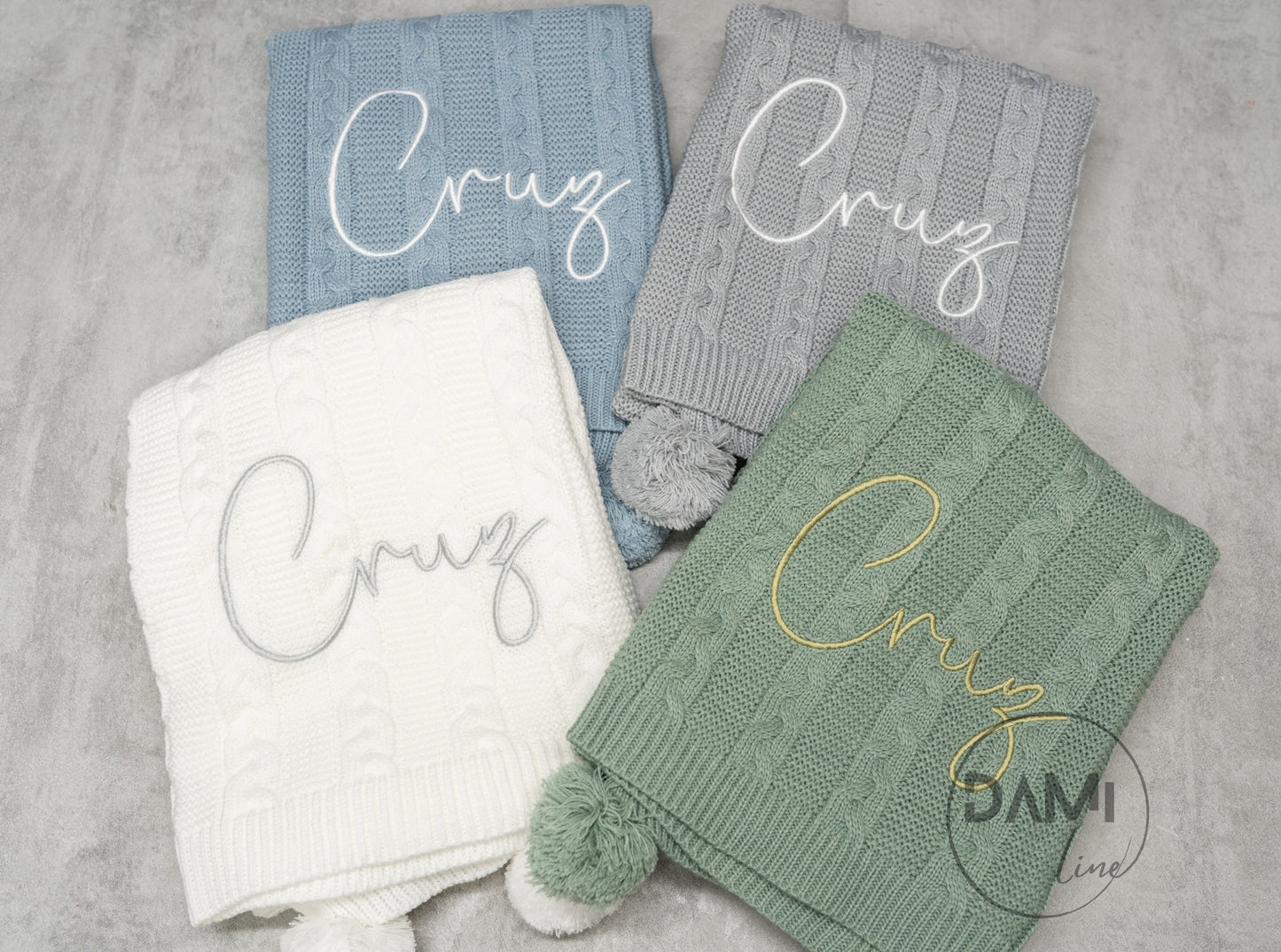 Personalised knitted baby blanket with 2 Pom-poms. Multiple colours available