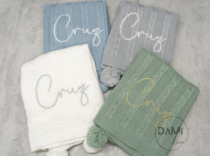 Personalised knitted baby blanket with 2 Pom-poms. Multiple colours available