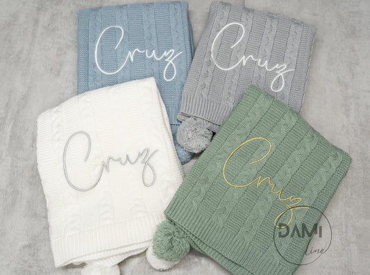 Personalised knitted baby blanket with 2 Pom-poms. Multiple colours available