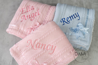 Personalised baby knitted blanket with satin bow and white sherpa back