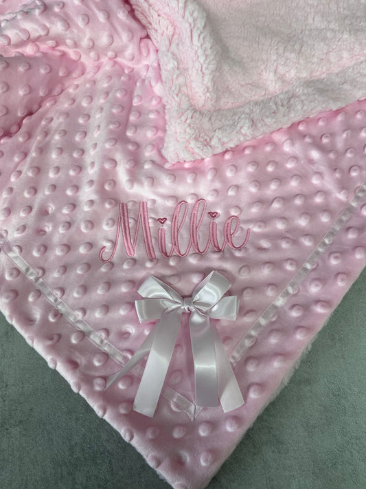 Bubble blanket with satin bow and sherpa back. Personalised