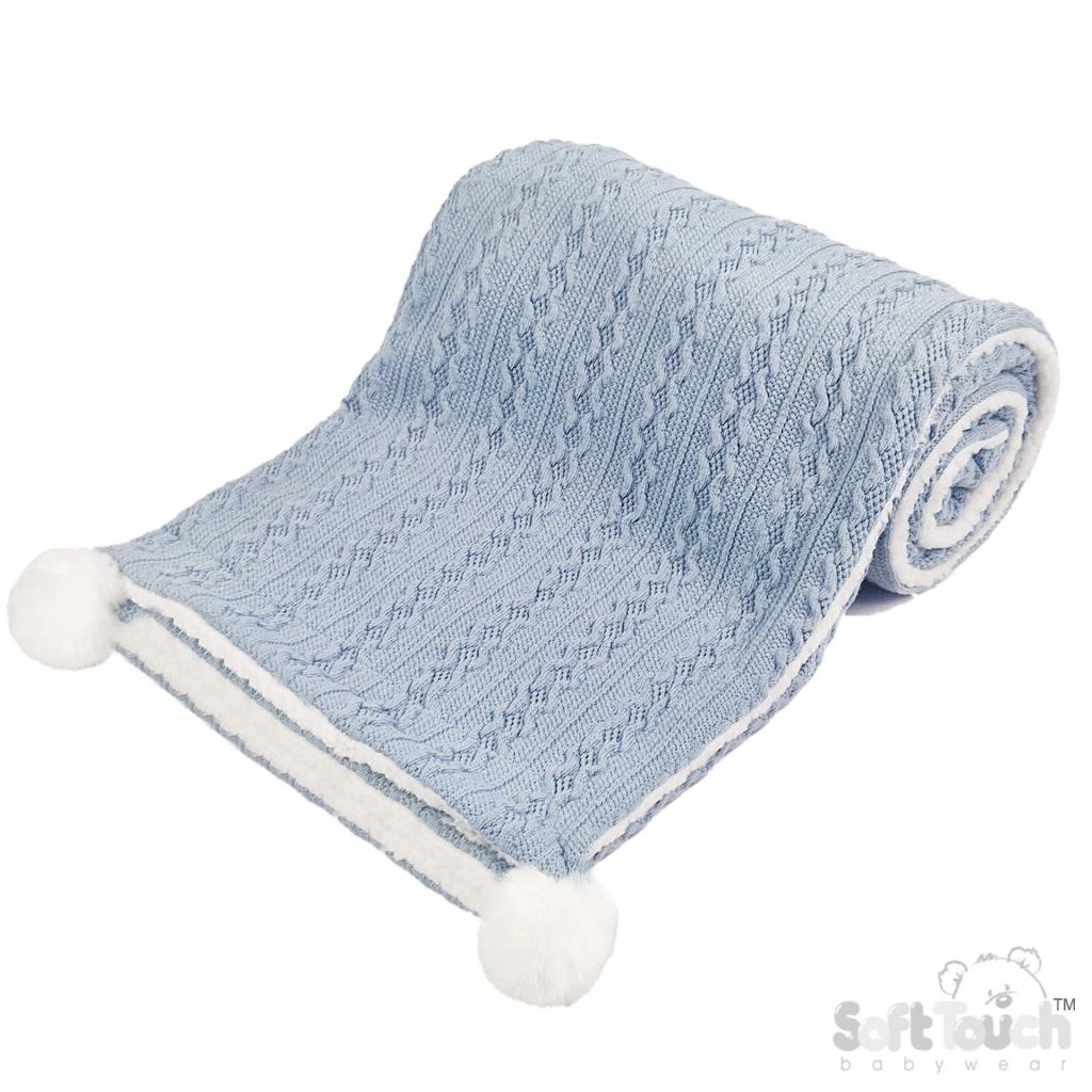 Personalised knitted baby blanket with white sherpa lining and 2 pom-poms.