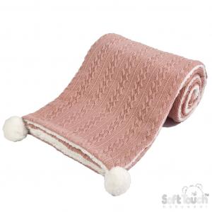 Personalised knitted baby blanket with white sherpa lining and 2 pom-poms.