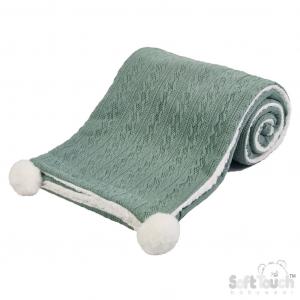 Personalised knitted baby blanket with white sherpa lining and 2 pom-poms.