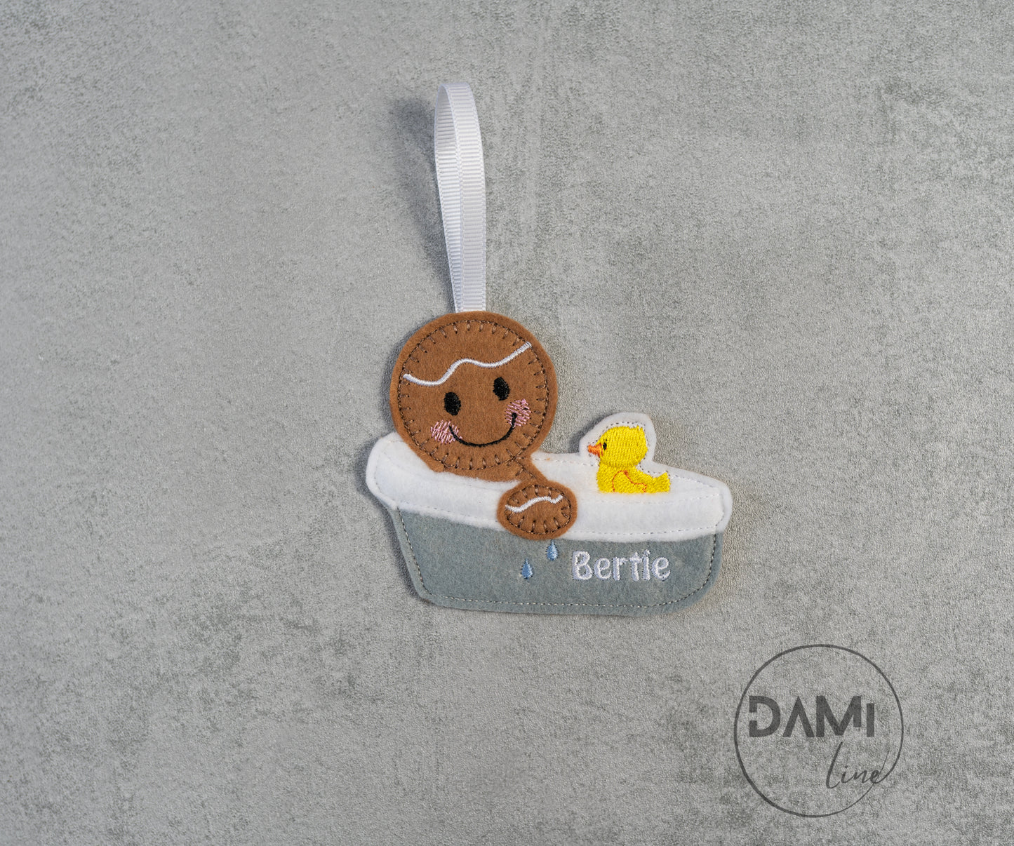 Baby in bath gingerbread man hanging decoration