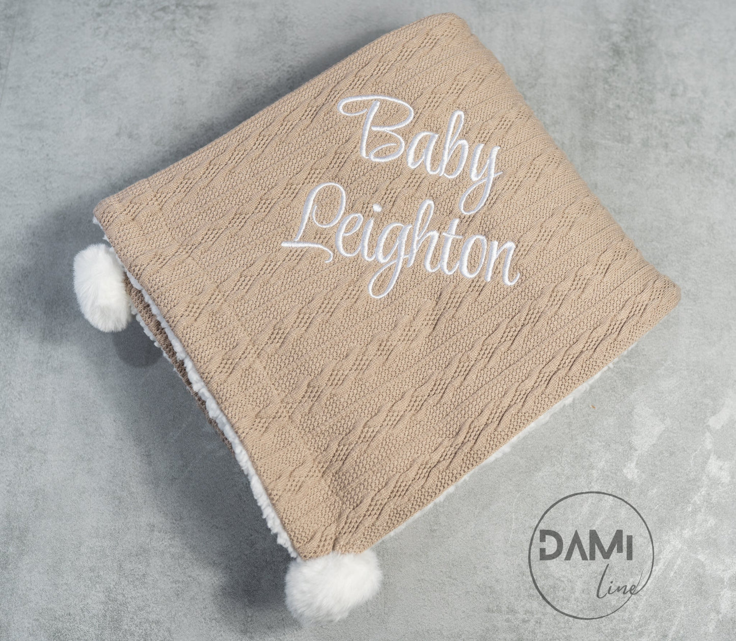 Personalised knitted COFFEE baby blanket with white sherpa lining and 2 pom-poms.